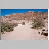 Petra - Blick vom ehem. Stadtzentrum auf die Felswand mit den Königsgräbern am Fuß des Jebel al-Khubtha