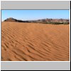 Sanddünen am Rande des Großen Sandmeeres Erg Ubari - Blick auf den Ort Alfejej