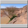 Wadi Mathandous - rechts felsiger Hang mit Steinritzungen