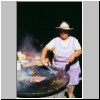 Cacaxtla - eine Frau bei der Tacos-Zubereitung