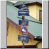 Ushuaia (Feuerland) - Welt-Wegweiser an der Hauptgeschäftsstraße Av. San Martin