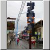 Ushuaia (Feuerland) - Welt-Wegweiser an der Hauptgeschäftsstraße Av. San Martin